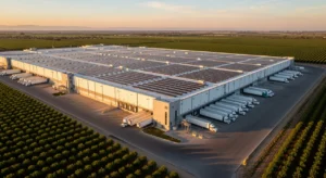 Aerial view of Central Valley Cold Storage facility at Madera Airport Industrial Park with solar arrays and nut orchards